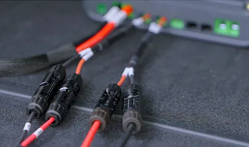 Connect the power station's solar charging cable and solar panels to Charger 2